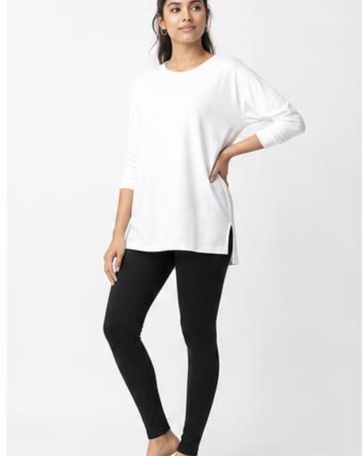 Woman model wearing the Women's Cotton-Blend Leggings in Black, showing the close everyday fit
